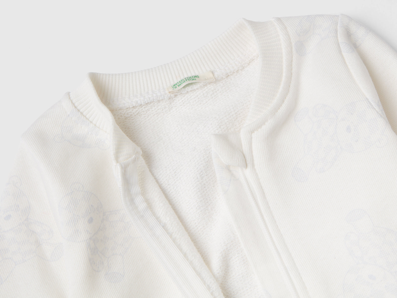 Felpa fantasia con zip da neonato bianco 2 | Benetton Outlet