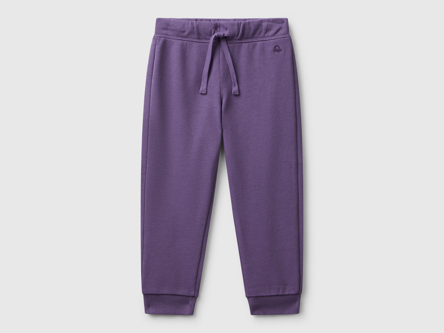Pantaloni in felpa di cotone da bimba viola | Benetton Outlet