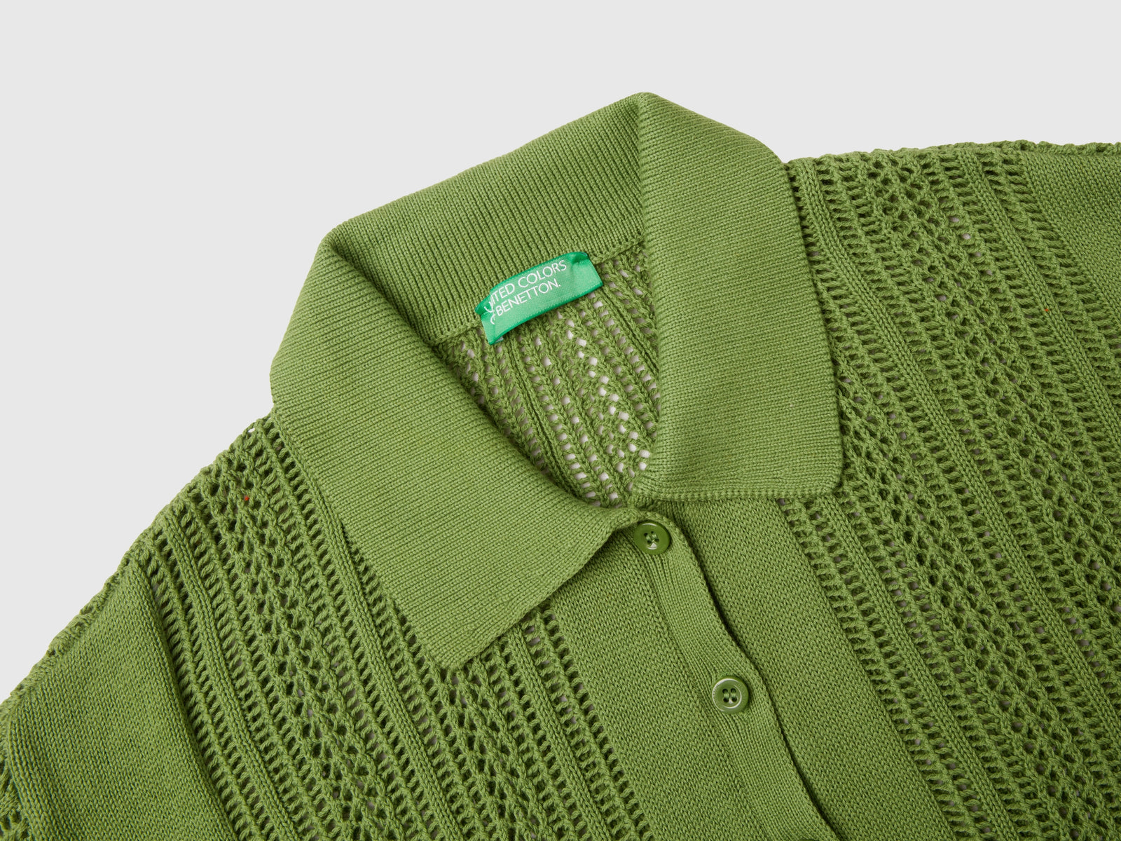 Polo in maglia crochet da donna verde militare 3 | Benetton Outlet
