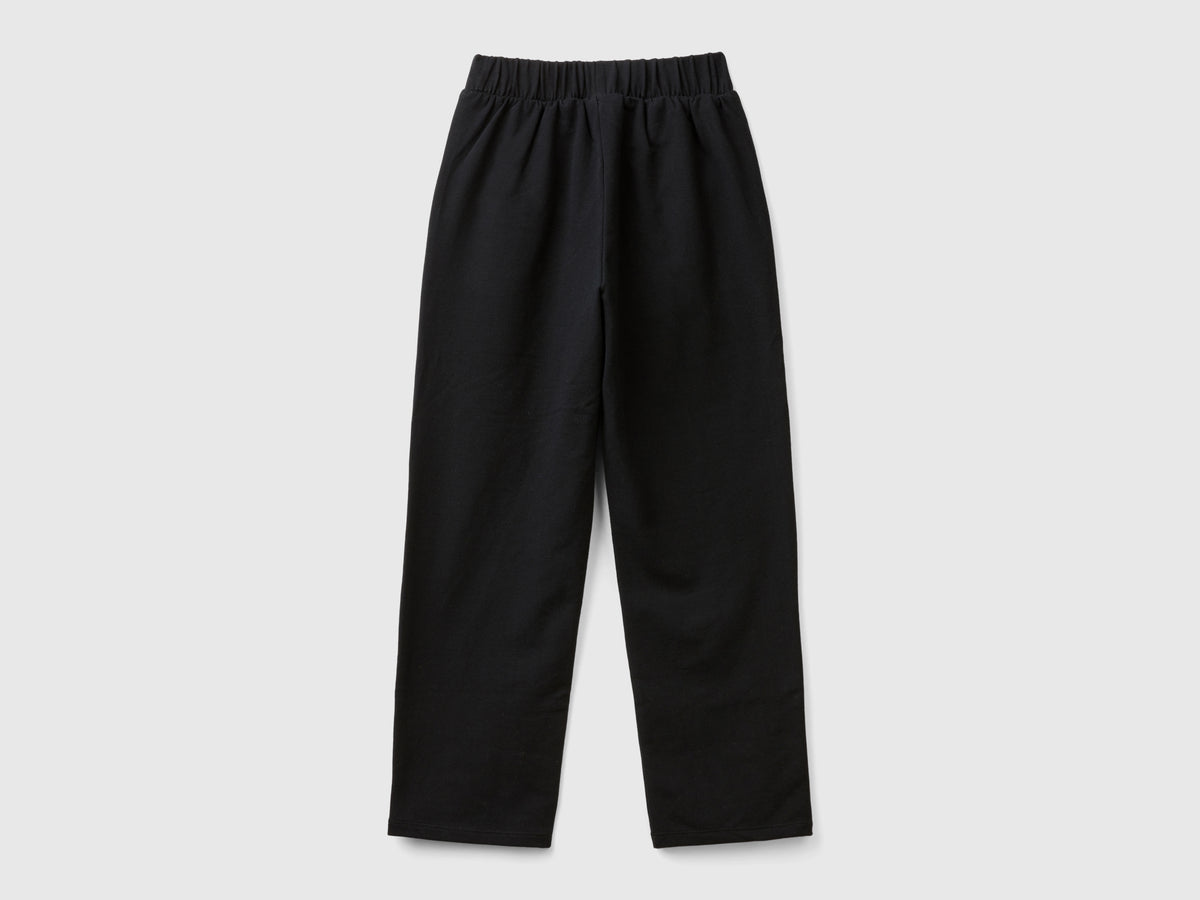 Pantaloni con applicazione effetto gioiello