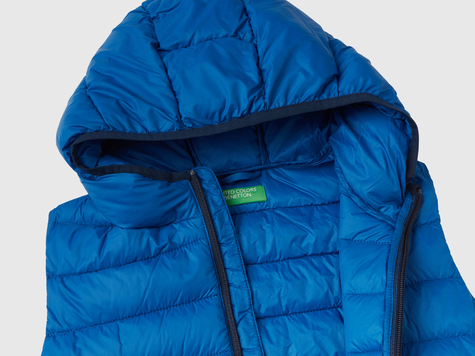 Gilet imbottito con cappuccio da bambino bluette 3 | Benetton Outlet