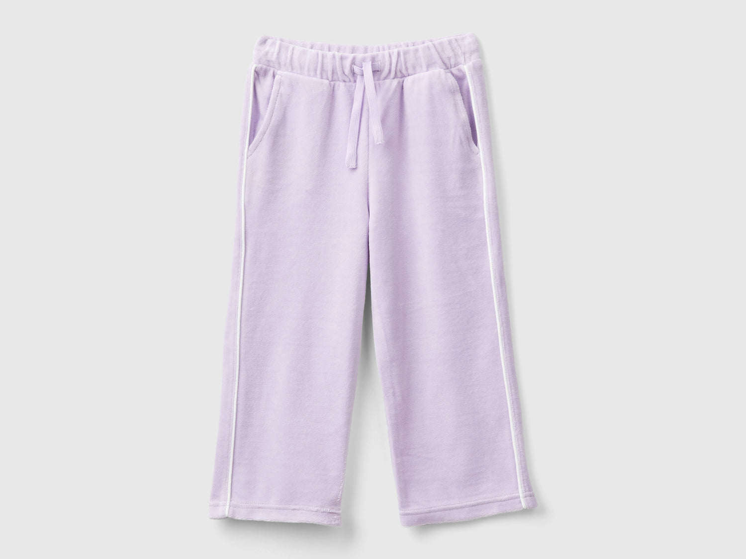 Pantaloni in ciniglia con logo da bimba lilla | Benetton Outlet