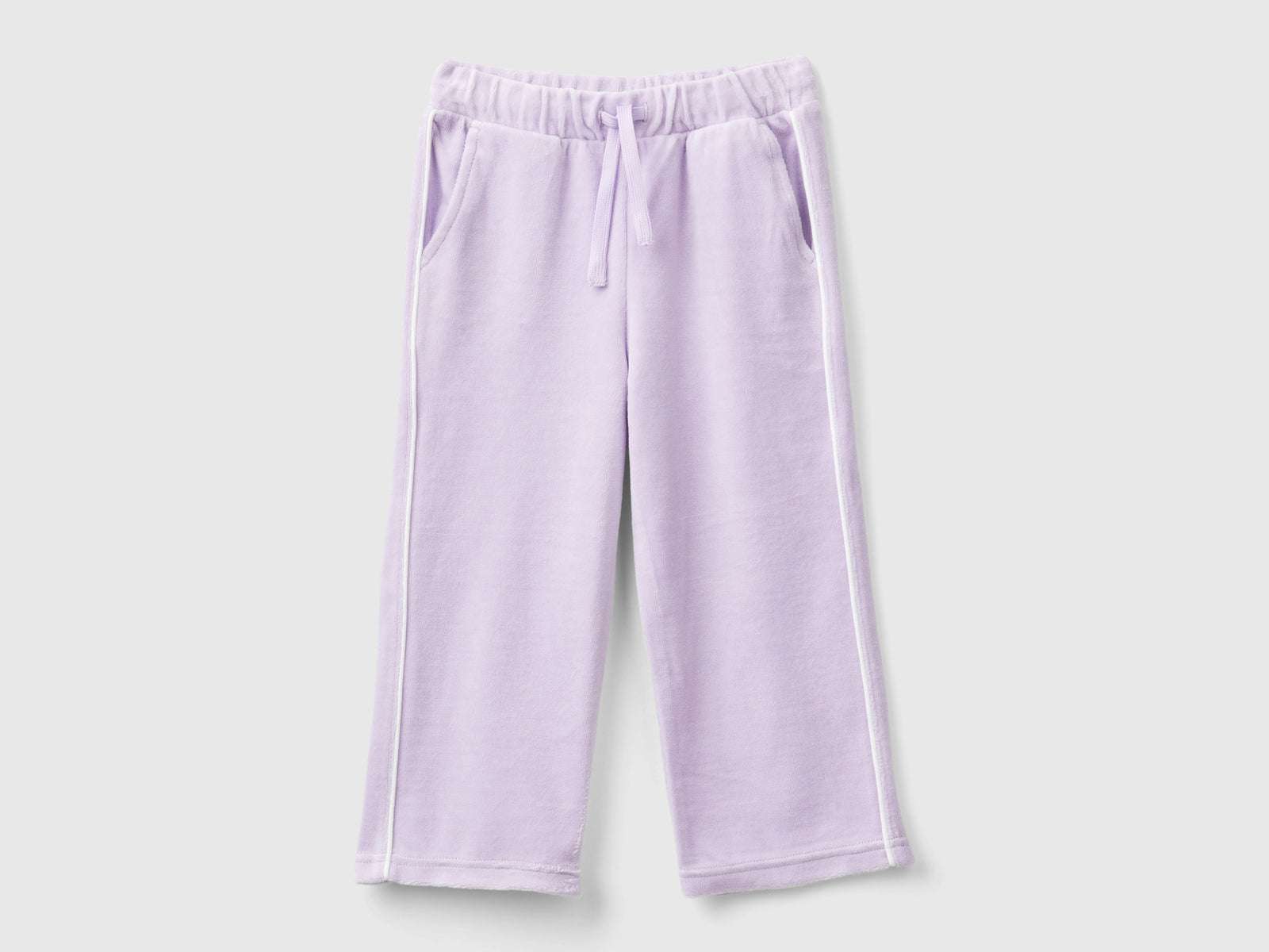 Pantaloni in ciniglia con logo da bimba lilla | Benetton Outlet