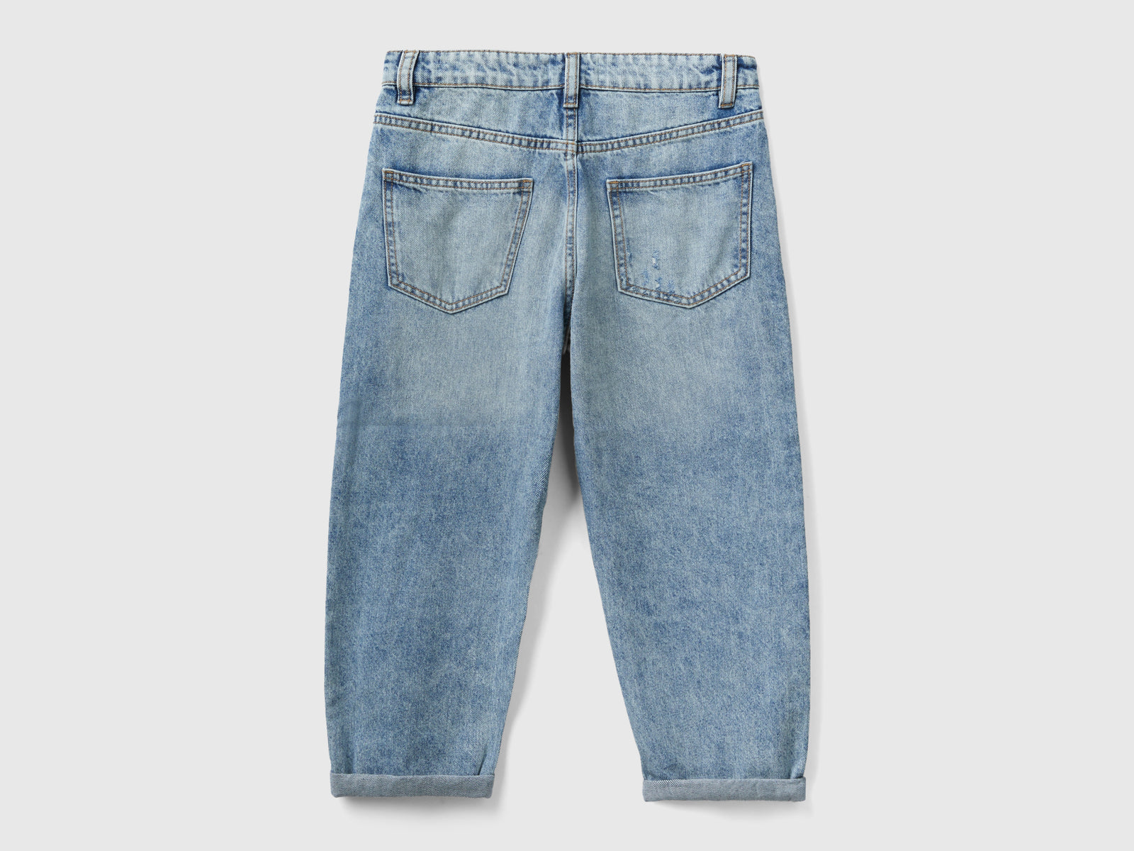 Jeans baloon fit con rotture da bambina azzurro 2 | Benetton Outlet