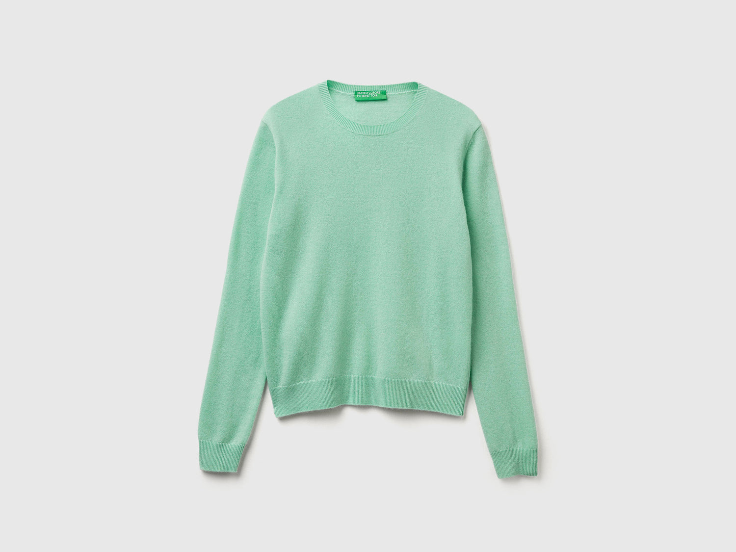 Maglia girocollo in lana Merino da donna verde chiaro | Benetton Outlet
