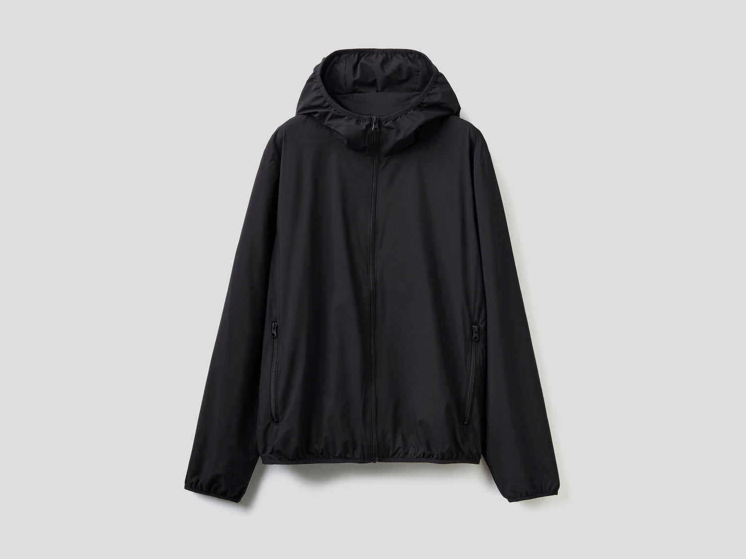 Giubbino "Rain Defender" con cappuccio da uomo nero | Benetton Outlet