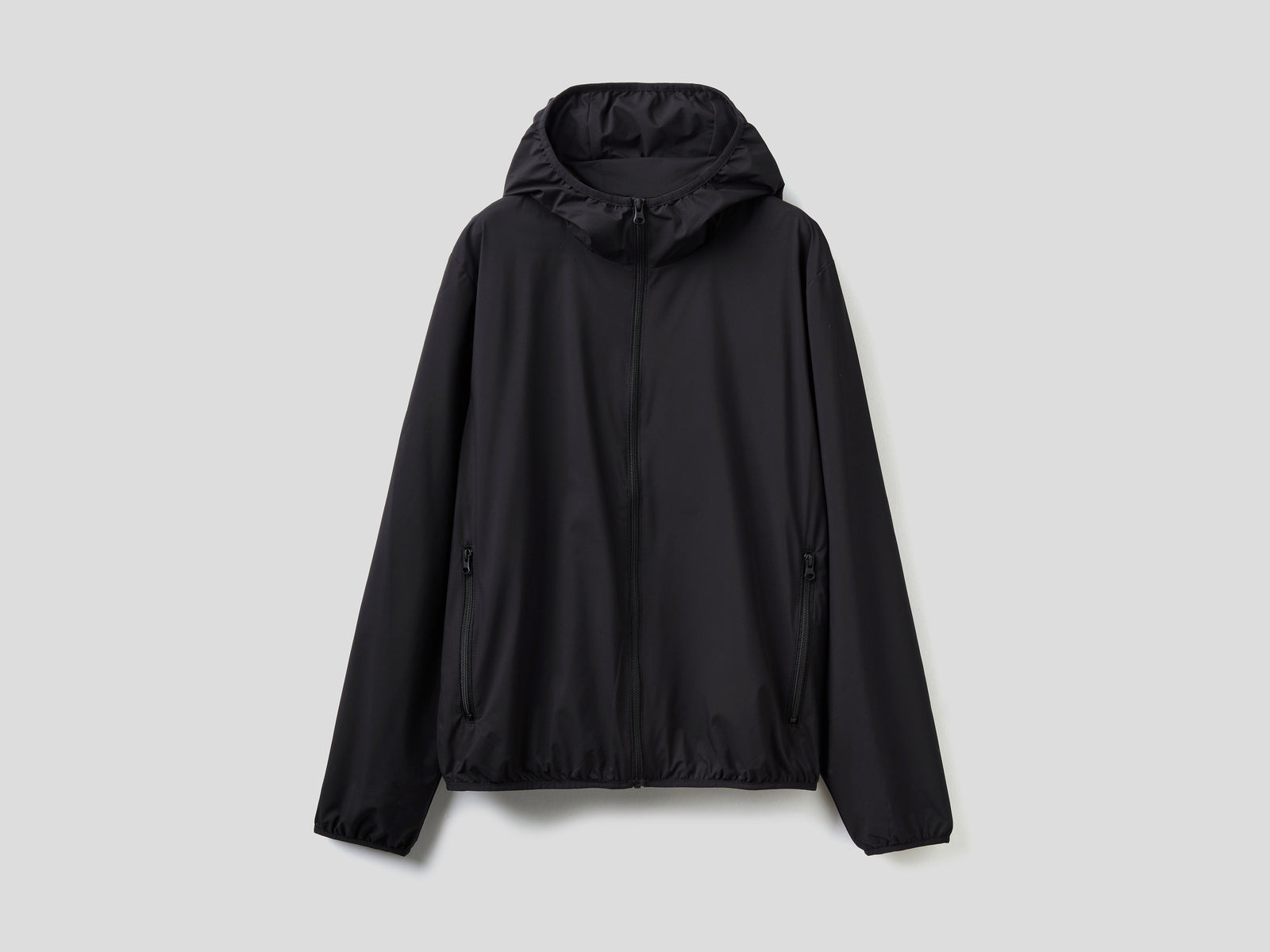 Giubbino "Rain Defender" con cappuccio da uomo nero | Benetton Outlet