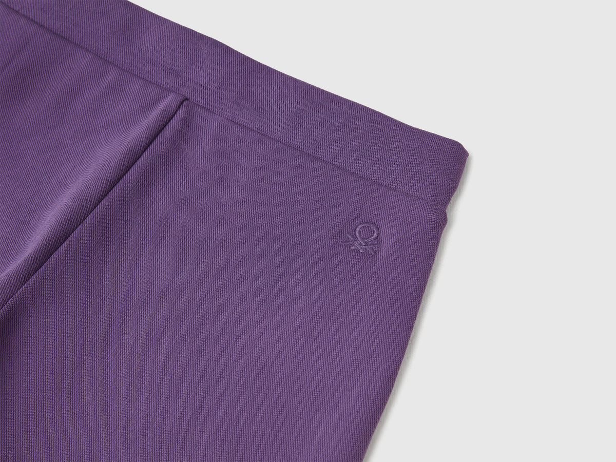 Pantaloni ampi in cotone stretch