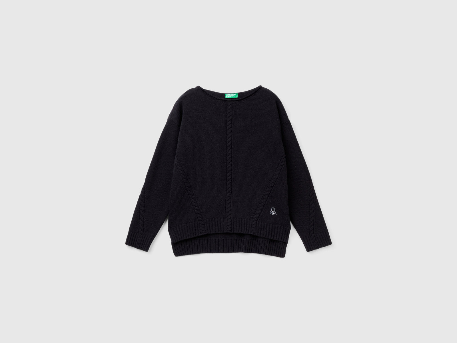 Maglia con trecce in misto lana da bambina nero | Benetton Outlet