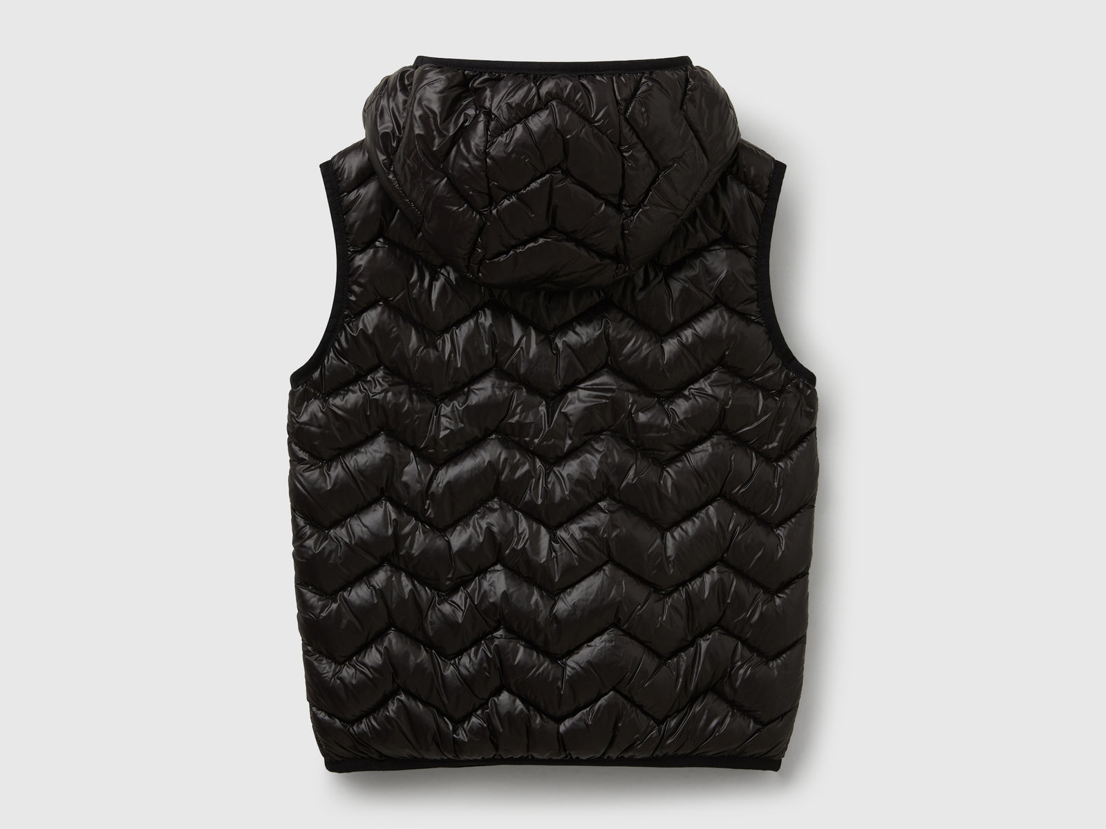 Gilet imbottito con cappuccio da bambina nero 2 | Benetton Outlet