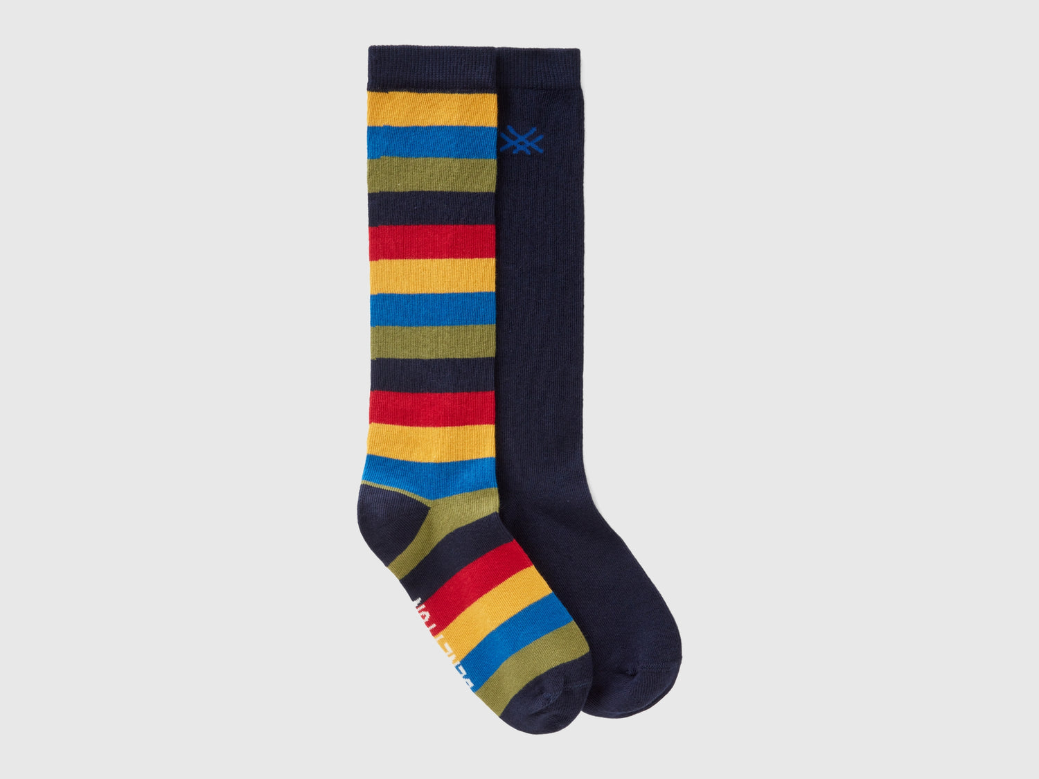 Due calzini lunghi jacquard da bambino multi-color | Benetton Outlet