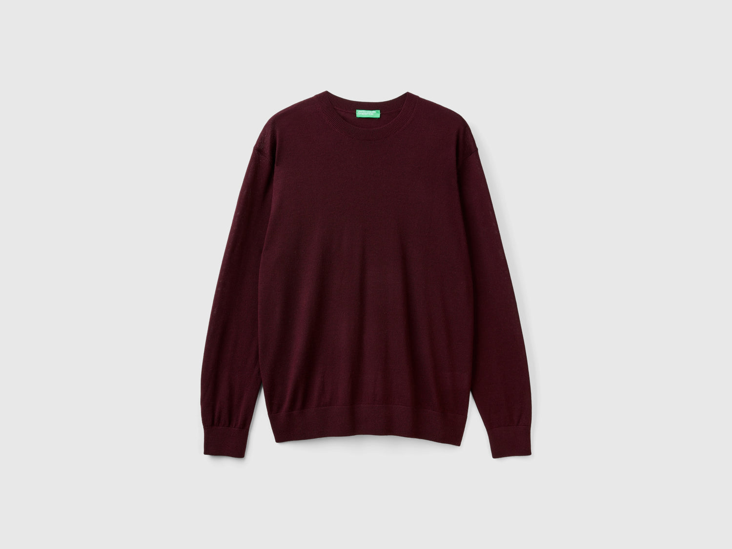 Maglia viola scuro in pura lana Merino da uomo malva scuro | Benetton Outlet
