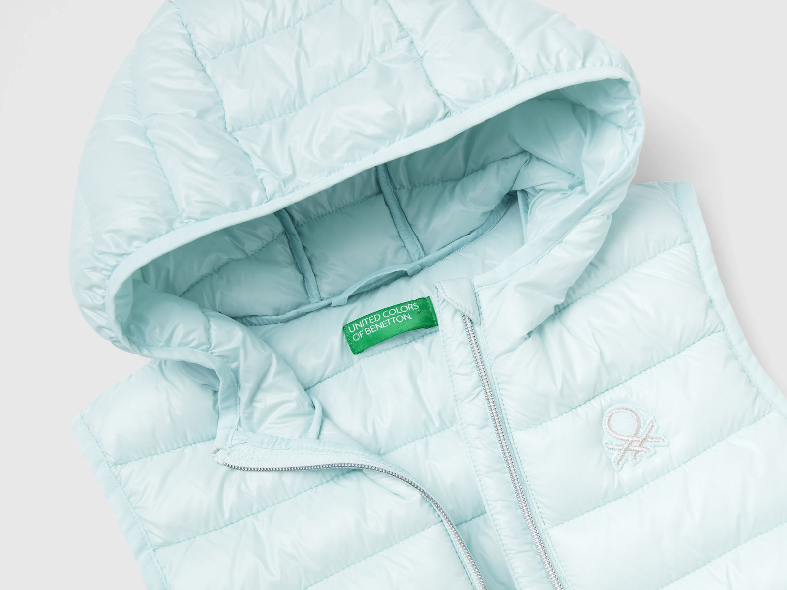 Gilet imbottito con cappuccio da bambina azzurro 3 | Benetton Outlet