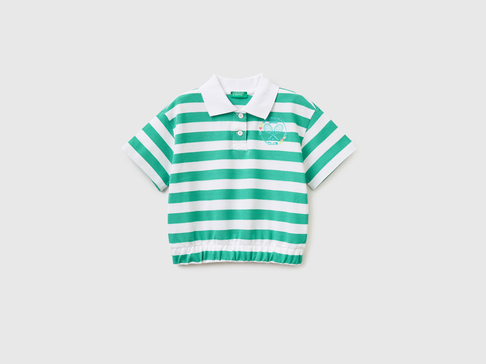 Polo a manica corta in piquet da bambina verde | Benetton Outlet