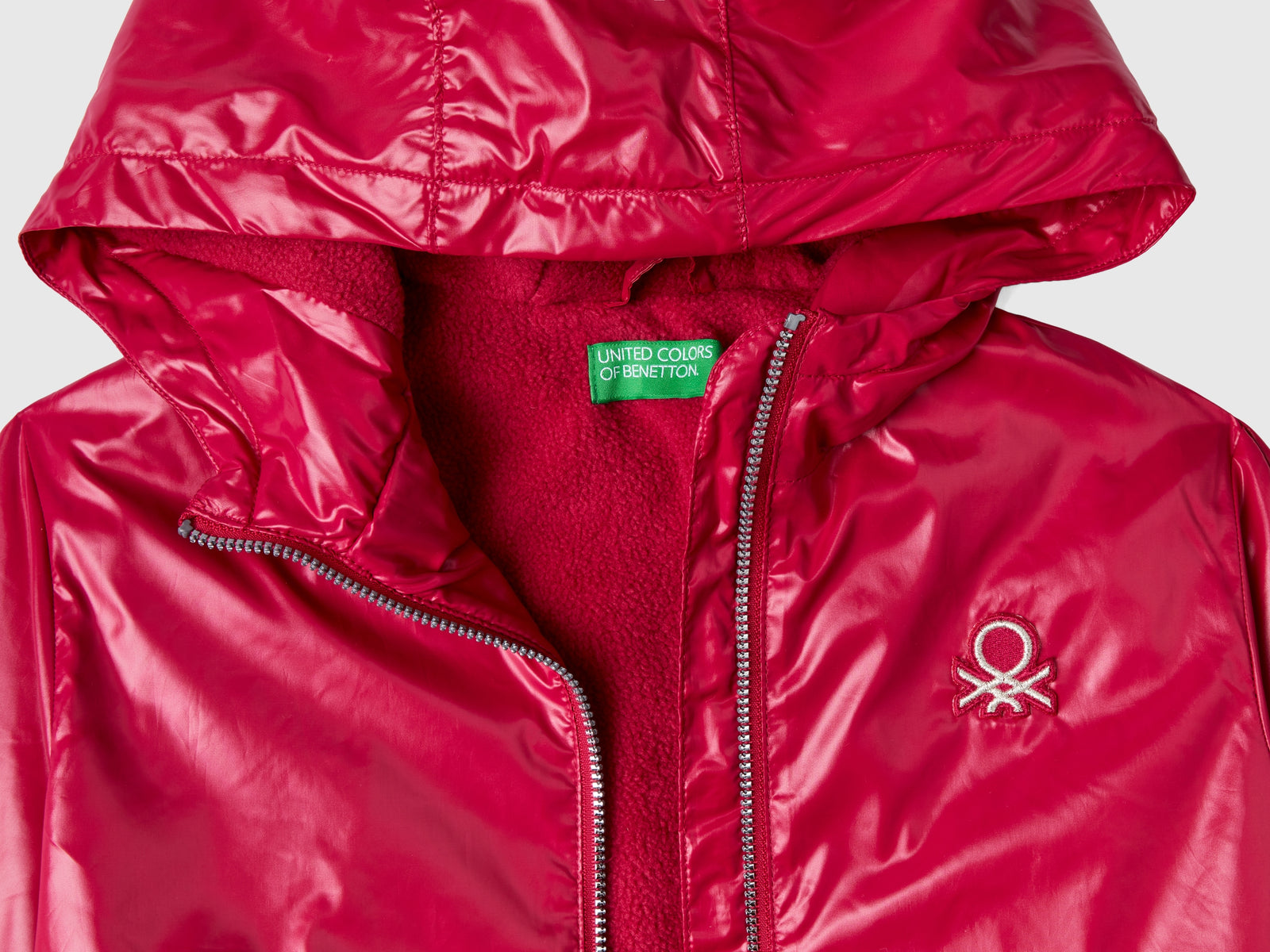 Giubbino lucido con zip e cappuccio da bambina ciclamino 3 | Benetton Outlet