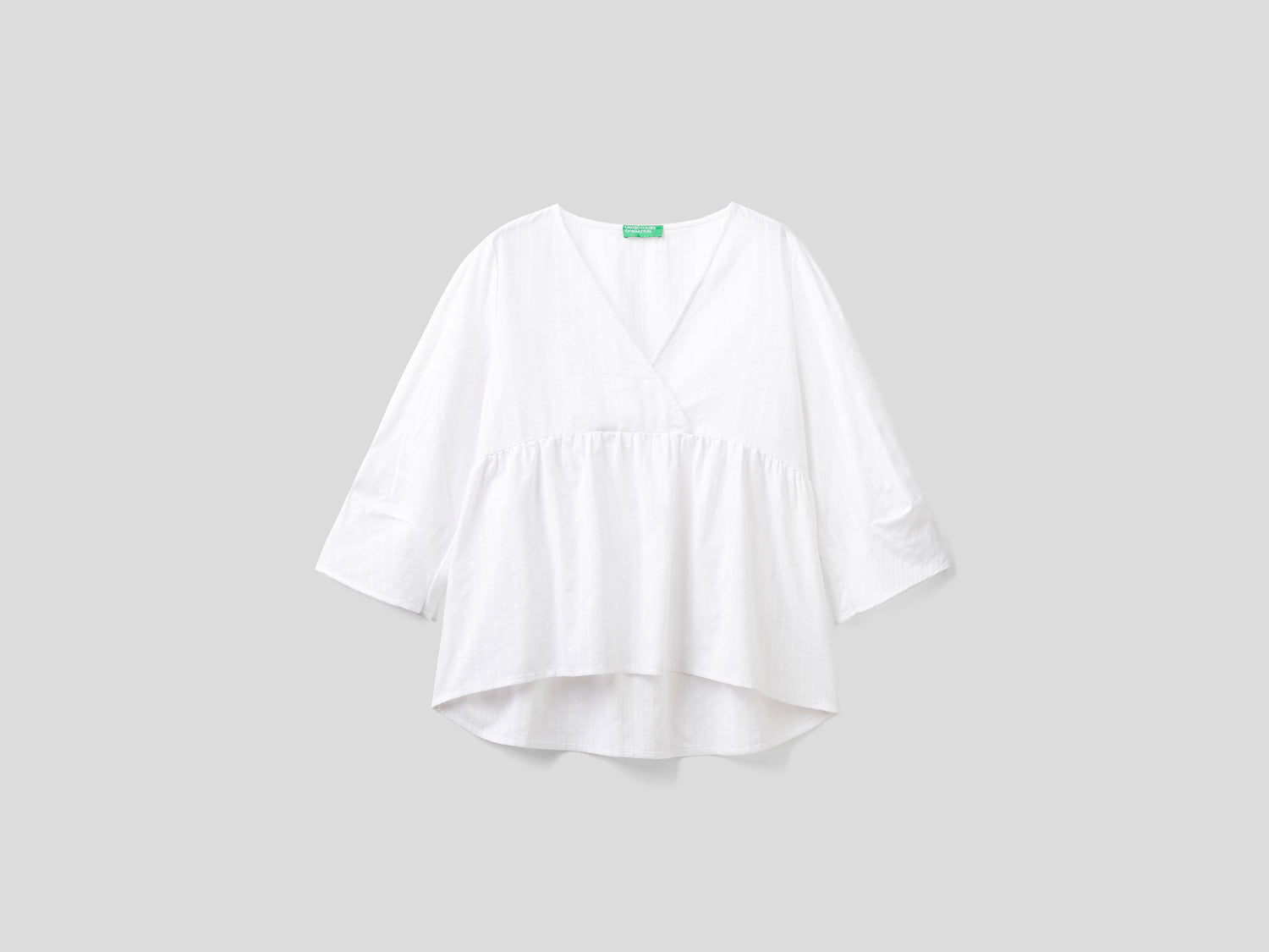 Camicia effetto stropicciato da donna bianco | Benetton Outlet