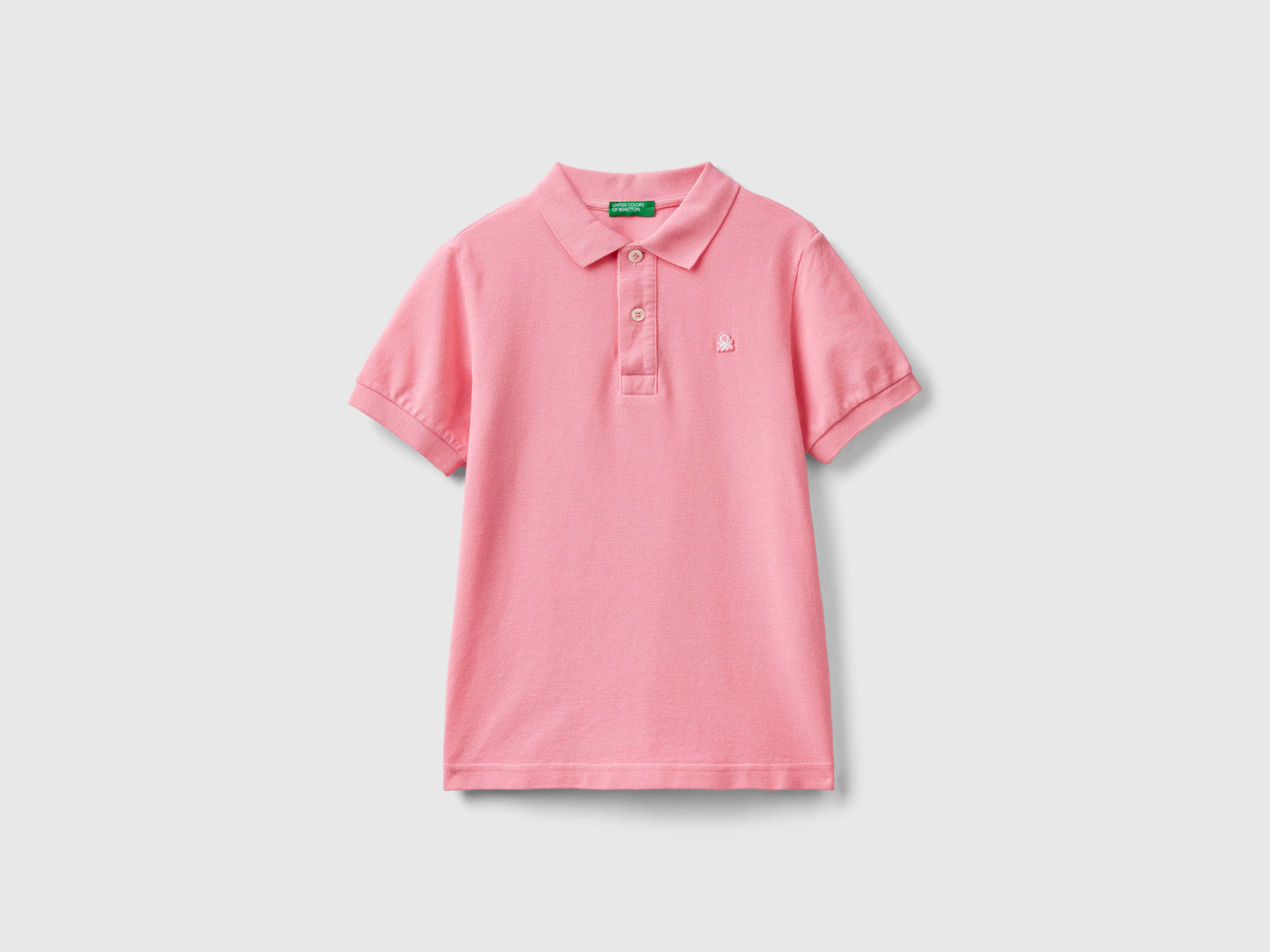 Polo slim fit 100% cotone da bambino rosa | Benetton Outlet