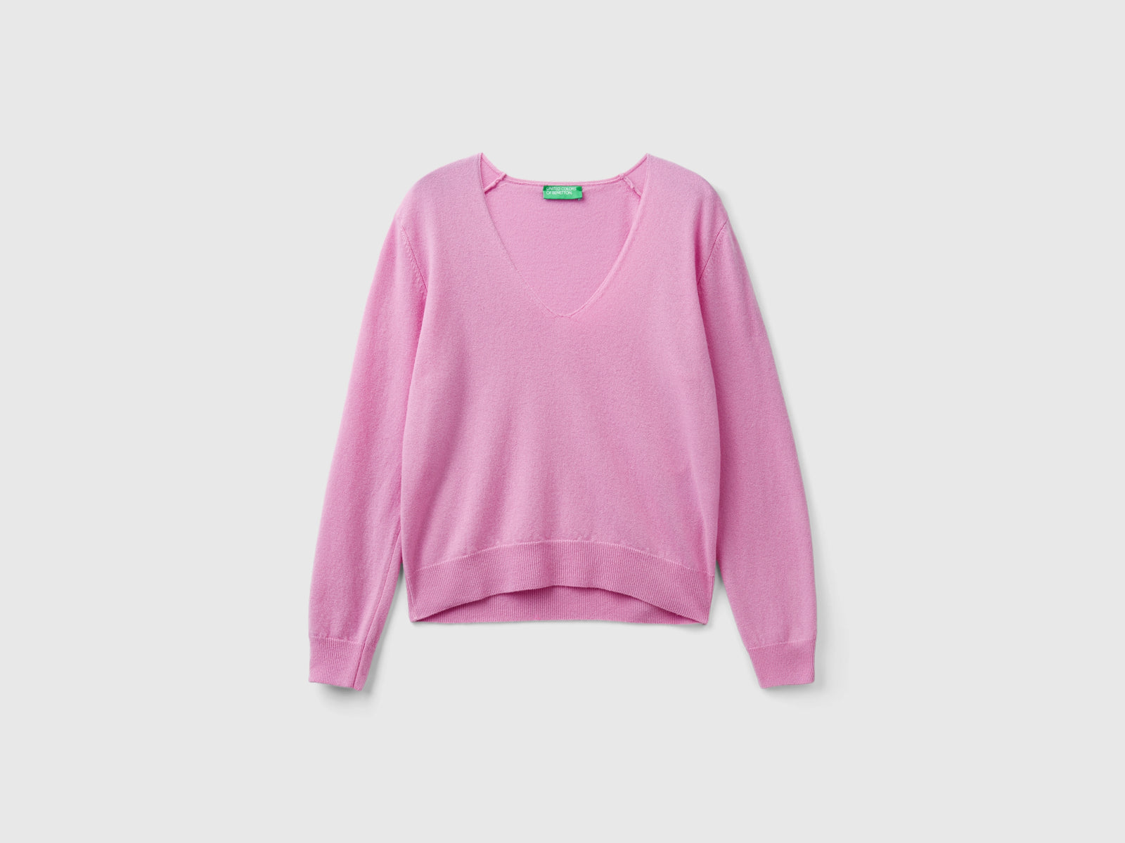 Maglione con scollo a V in pura lana Merino da donna lilla | Benetton Outlet