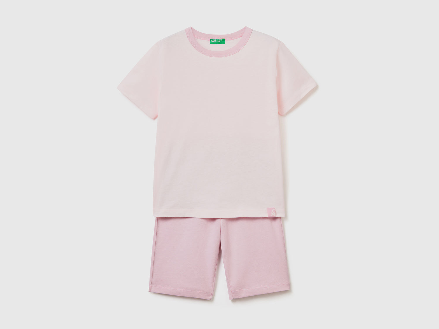 Pigiama corto in puro cotone leggero da bambino rosa pastello | Benetton Outlet