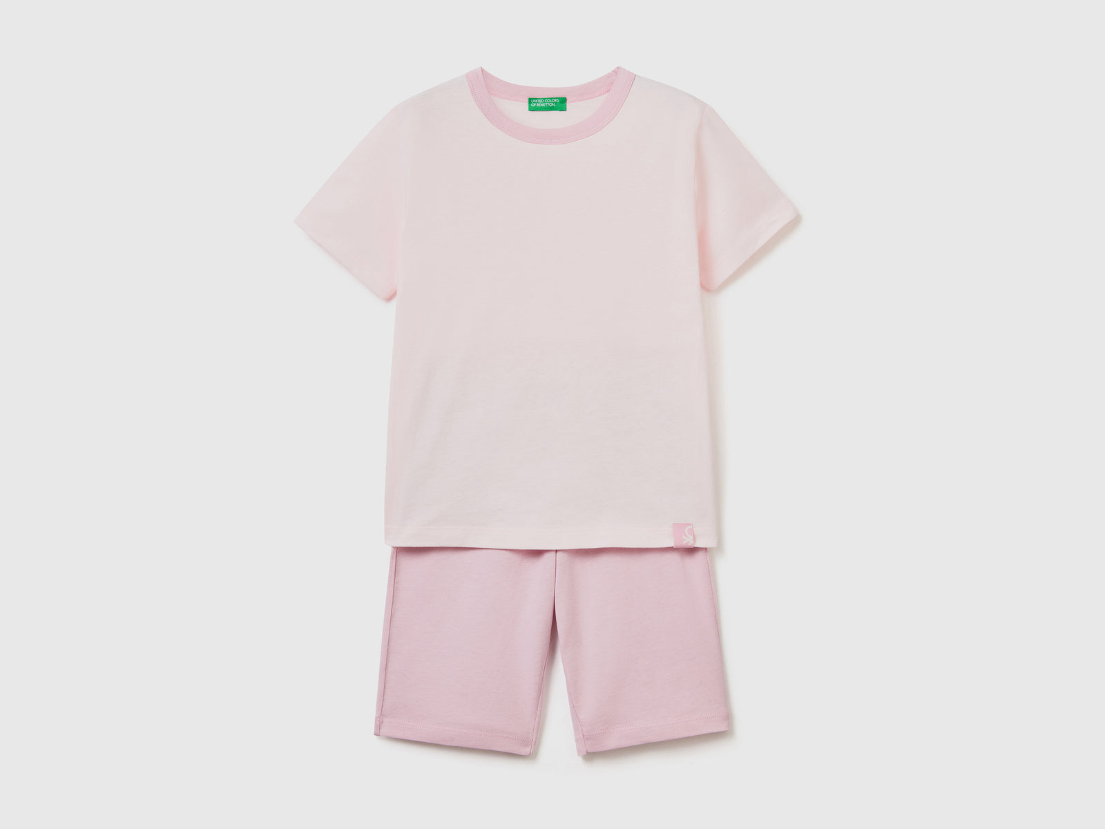 Pigiama corto in puro cotone leggero da bambino rosa pastello | Benetton Outlet