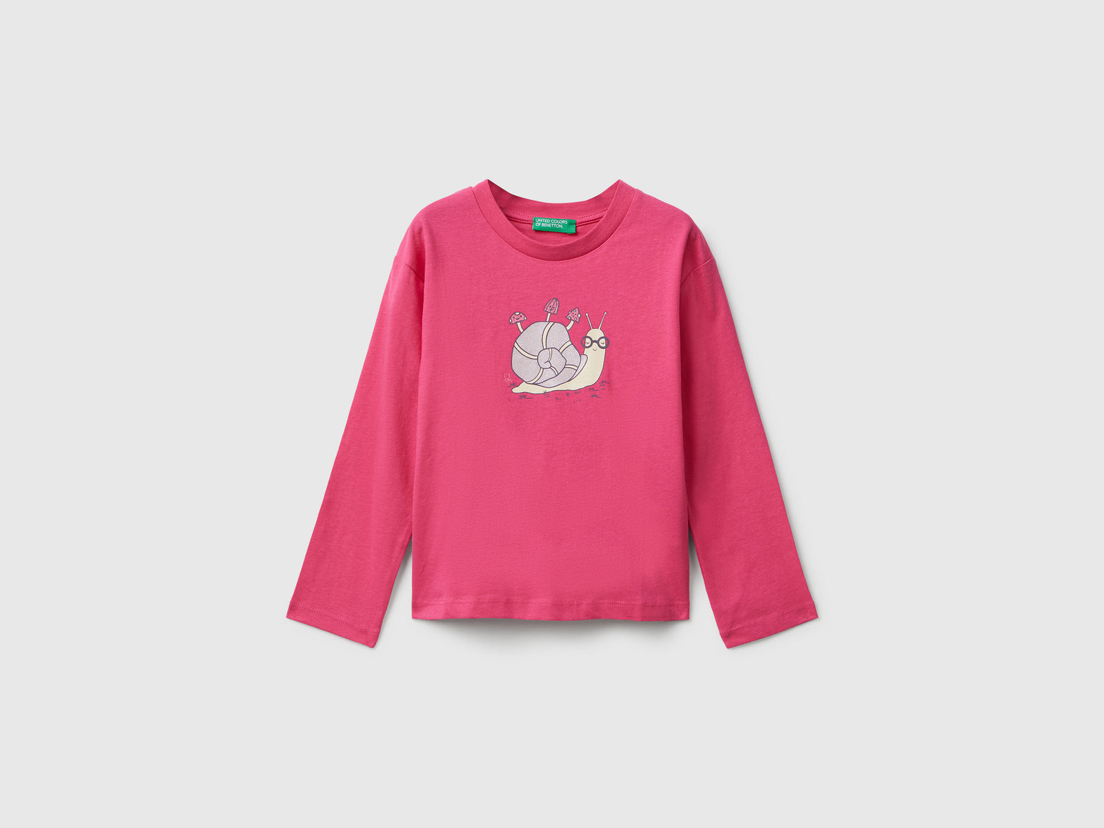 Maglietta in cotone con stampa glitter da bimba fucsia | Benetton Outlet