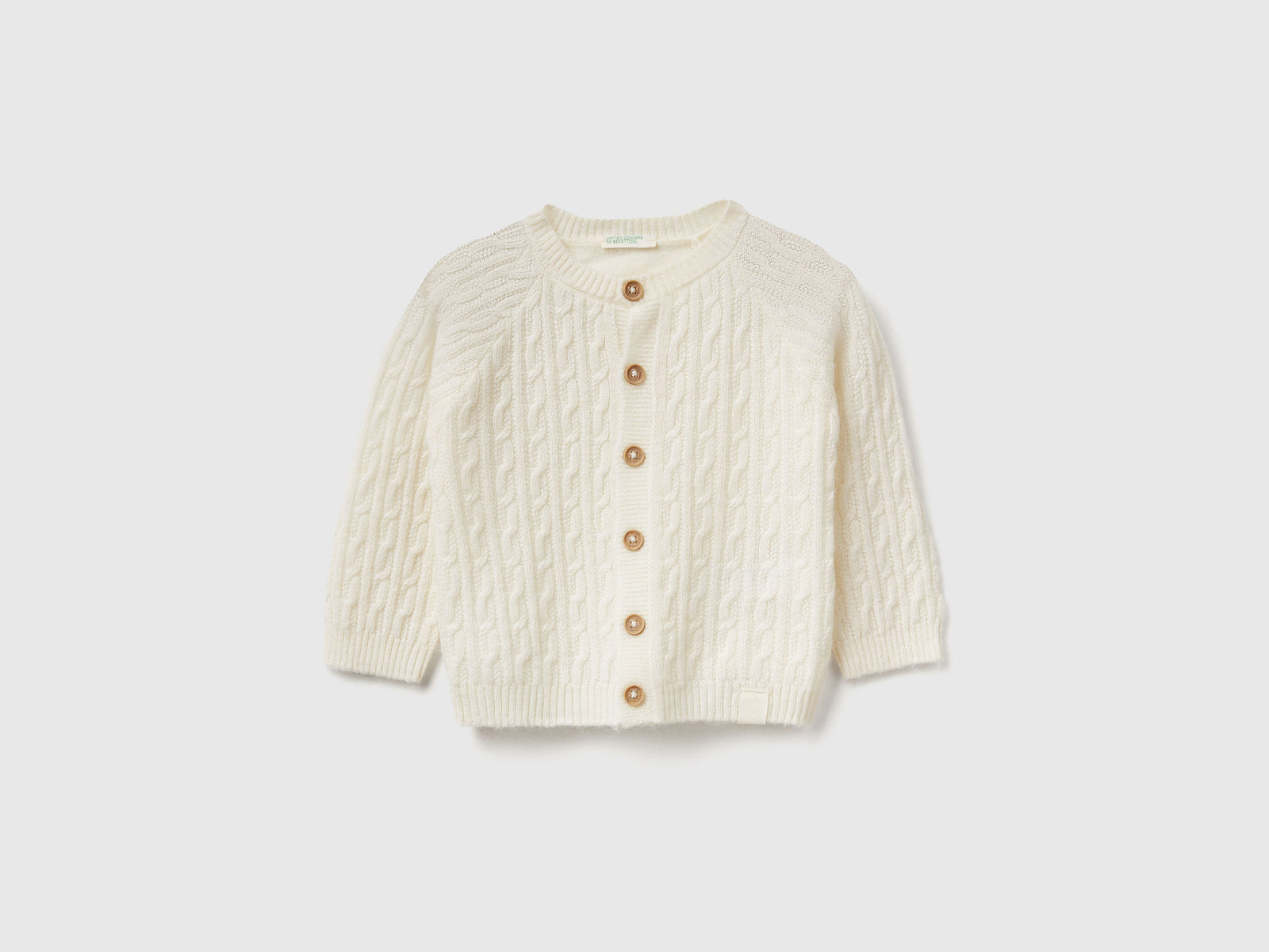 Cardigan a trecce da neonato bianco panna | Benetton Outlet