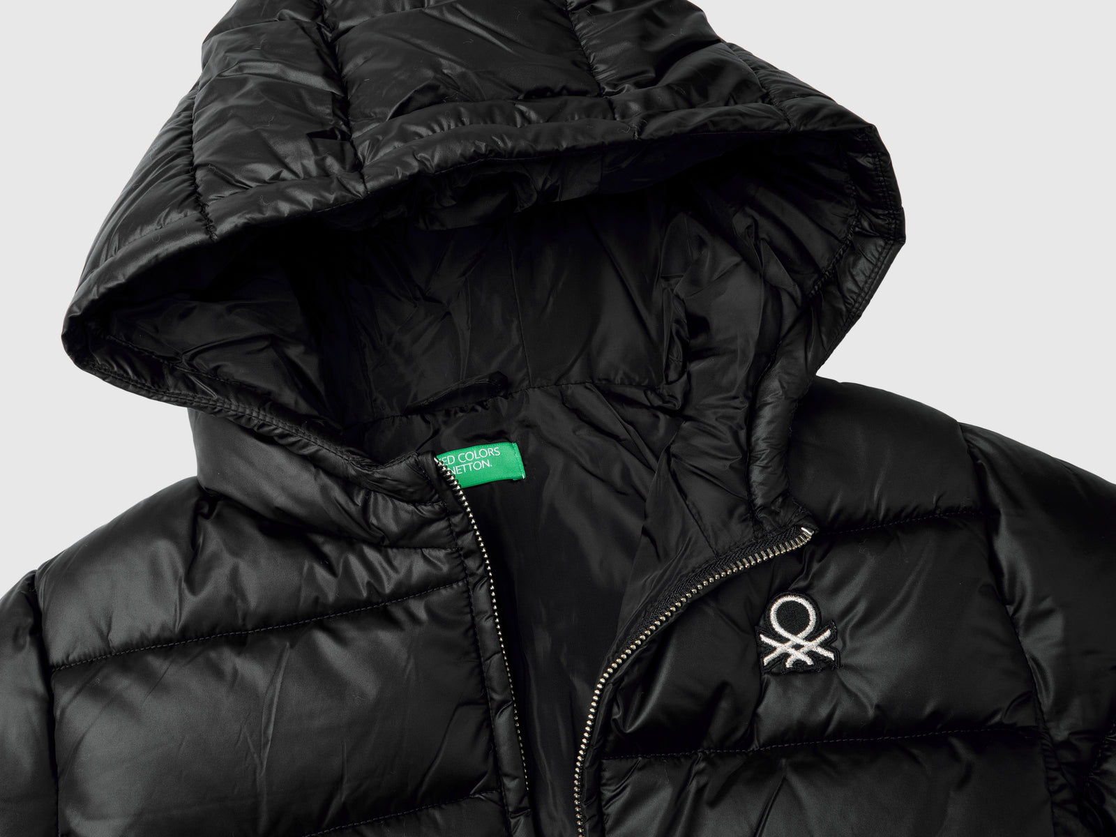 Giubbino lungo sciancrato da bambina nero 3 | Benetton Outlet
