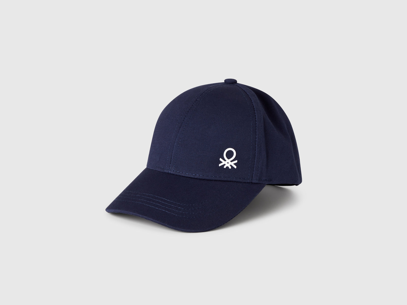 Cappellino in cotone con logo da bimbo blu scuro | Benetton Outlet