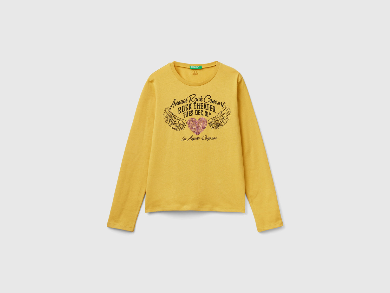T-shirt con applicazione borchie da bambina giallo | Benetton Outlet