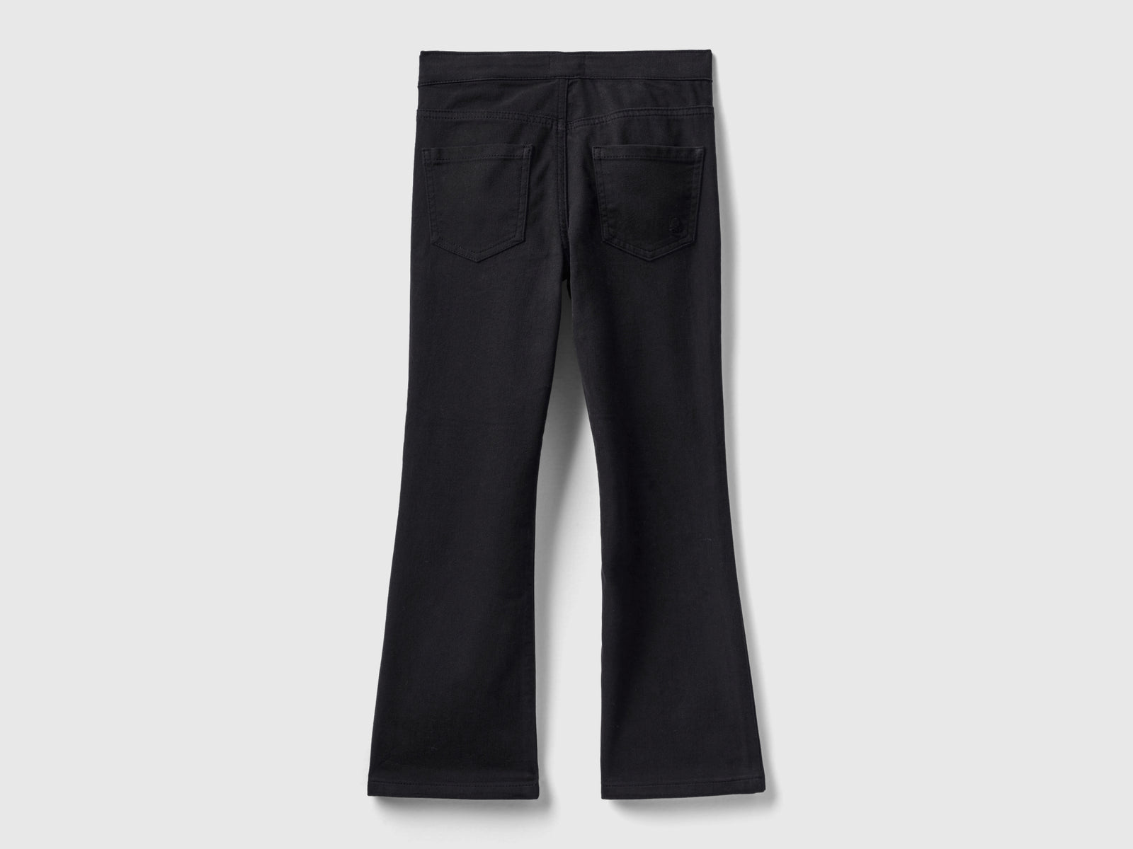 Pantaloni a zampa elasticizzati da bambina nero 2 | Benetton Outlet