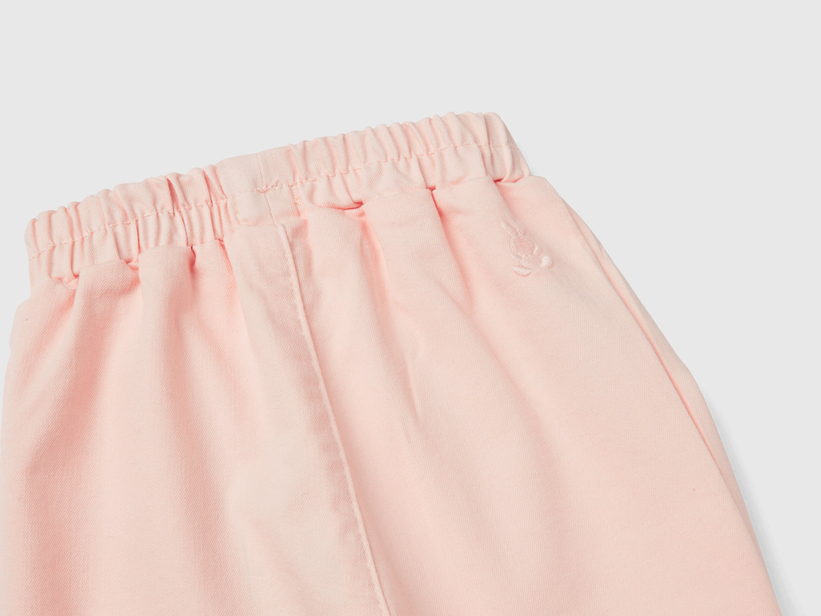 Pantaloni stretch con coulisse da neonato pesca 2 | Benetton Outlet