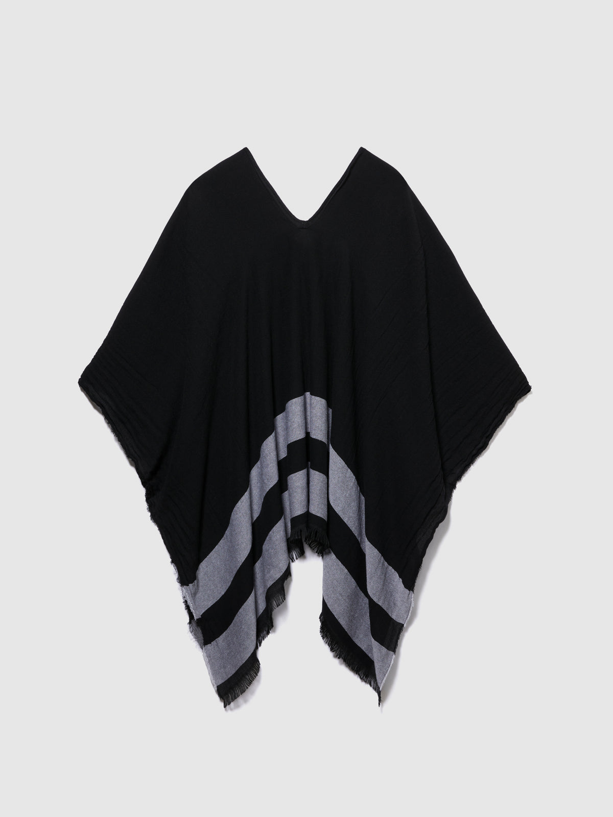 Poncho sfrangiato
