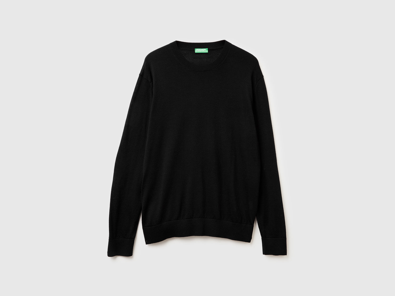 Maglia in pura lana Merino da uomo nero | Benetton Outlet