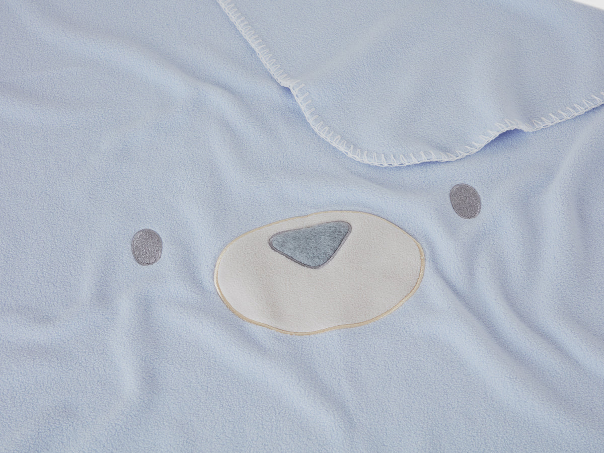 Coperta in pile con ricamo animaletto