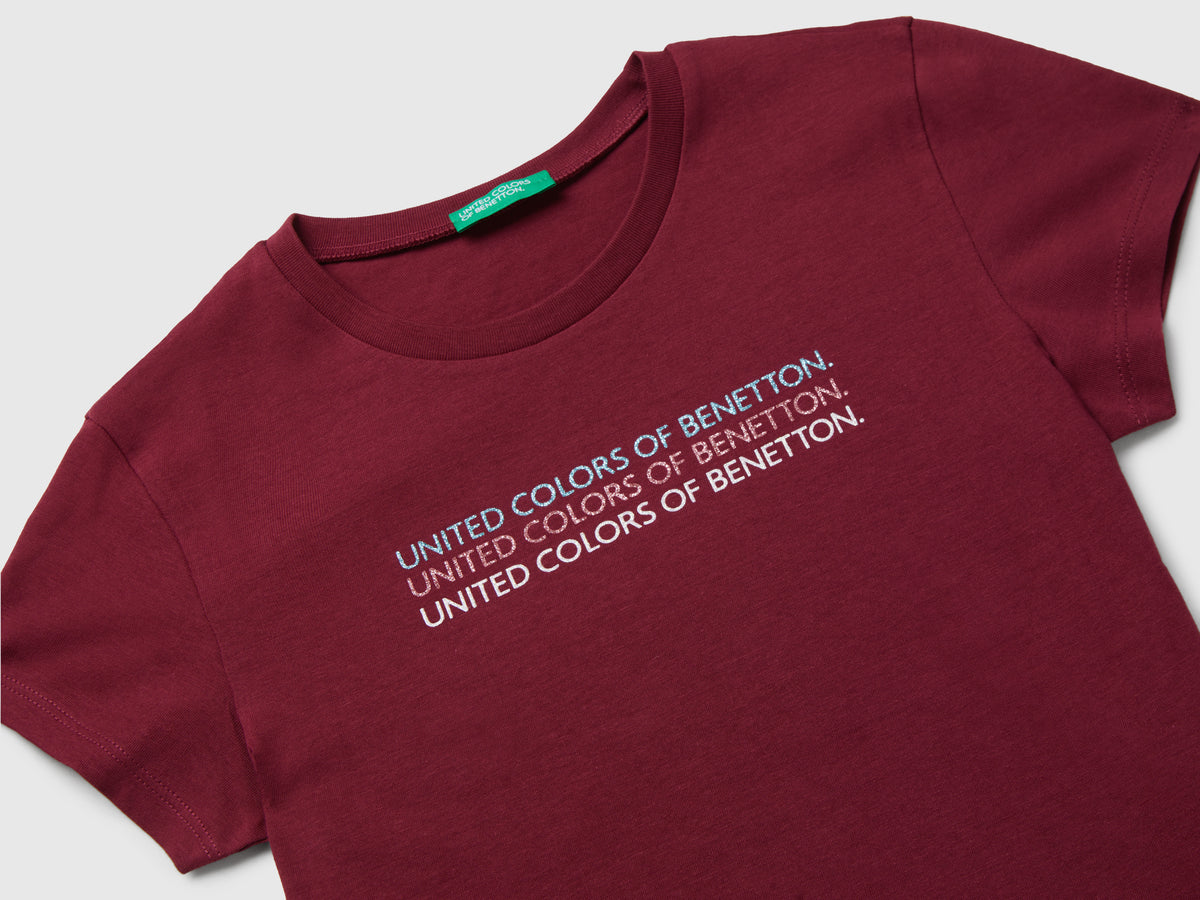 T-shirt con logo glitter
