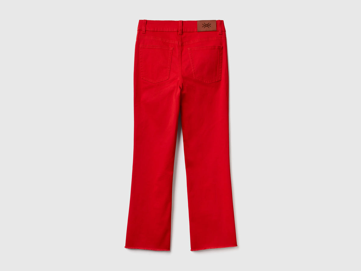 Pantaloni lunghi a trombetta in cotone elasticizzato