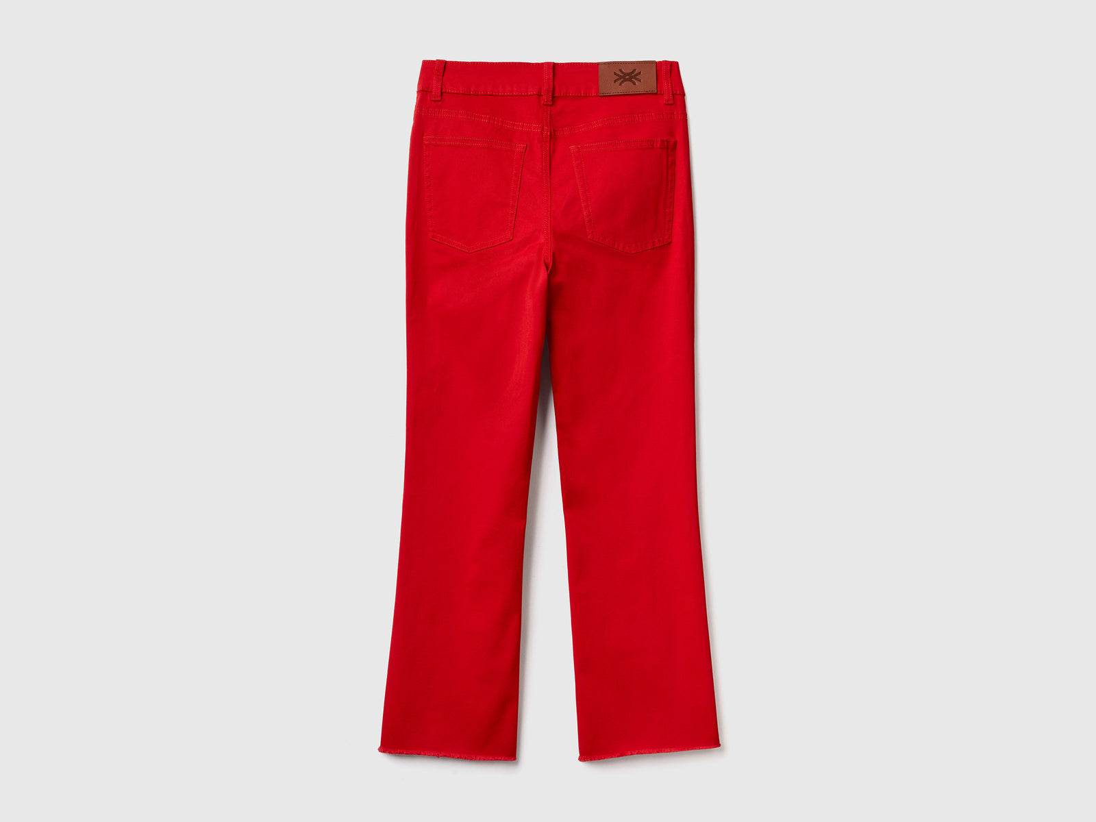 Pantaloni lunghi a trombetta in cotone elasticizzato da donna rosso 2 | Benetton Outlet