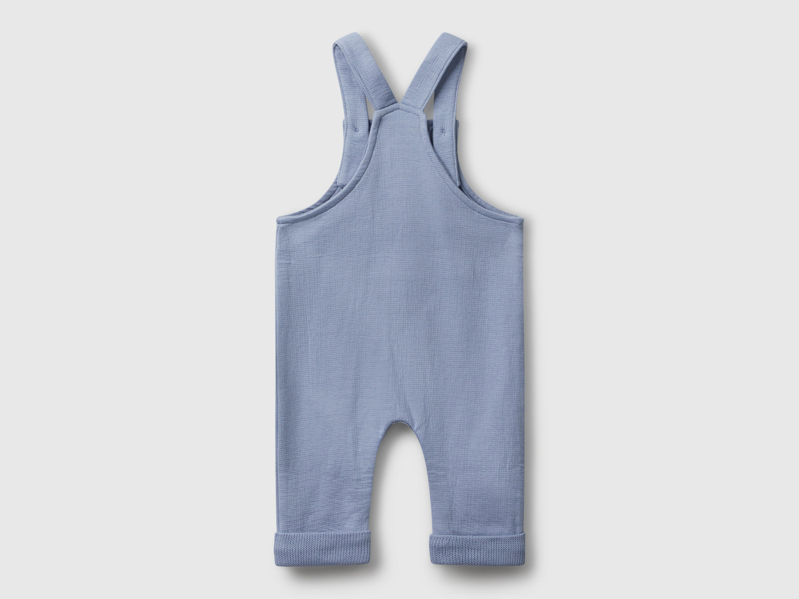 Salopette con tasca da neonato celeste 2 | Benetton Outlet