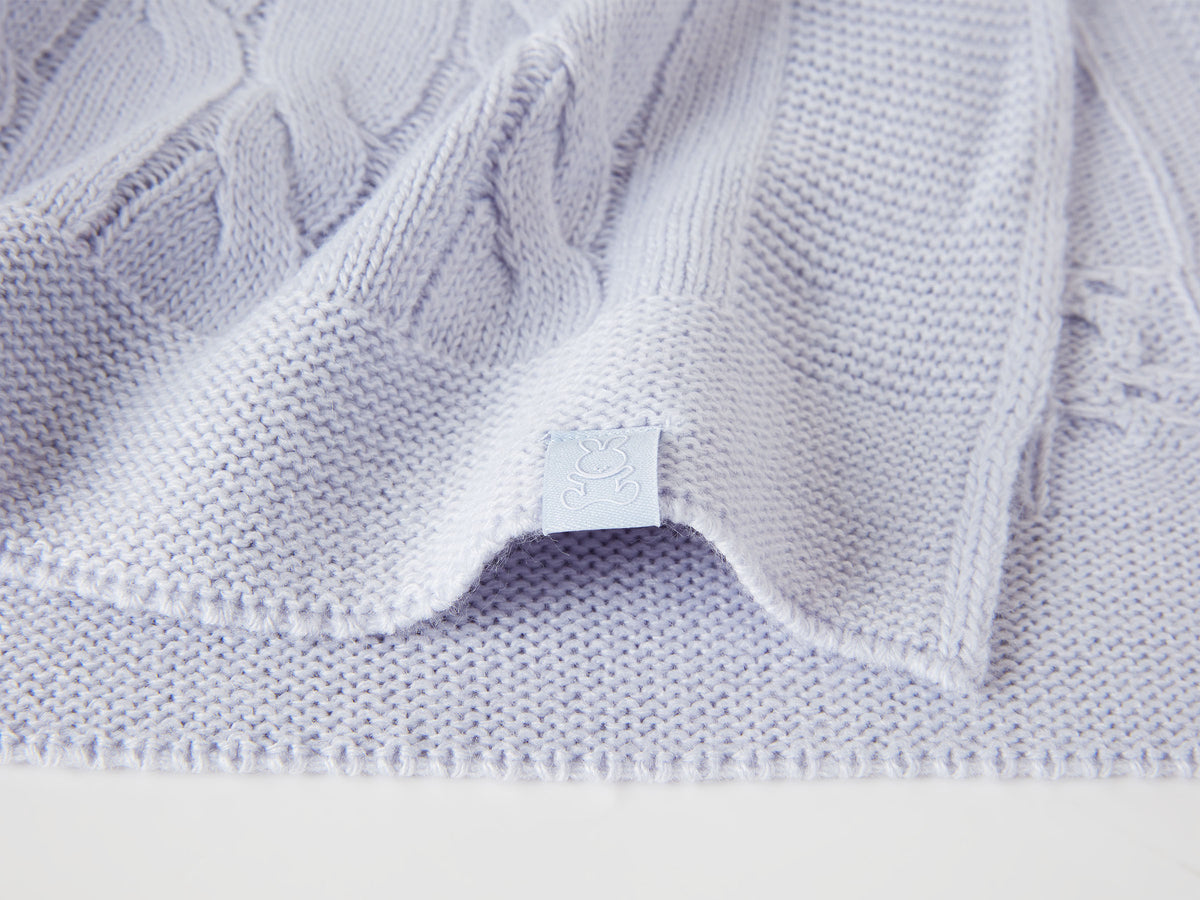Coperta con trecce