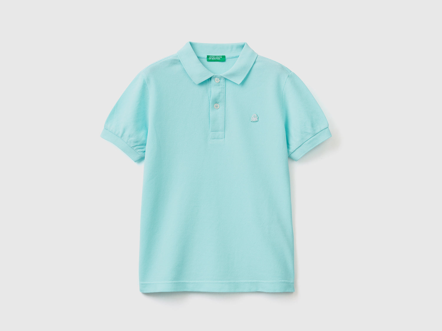 Polo slim fit 100% cotone da bambino turchese | Benetton Outlet