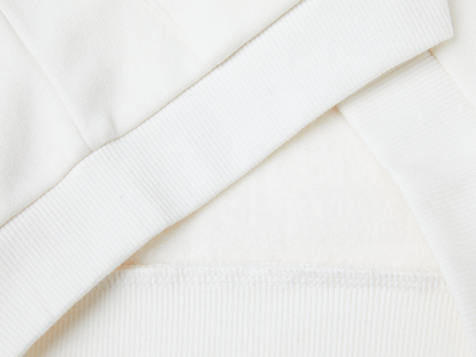 Felpa con zip e paillettes da bimba bianco panna 3 | Benetton Outlet