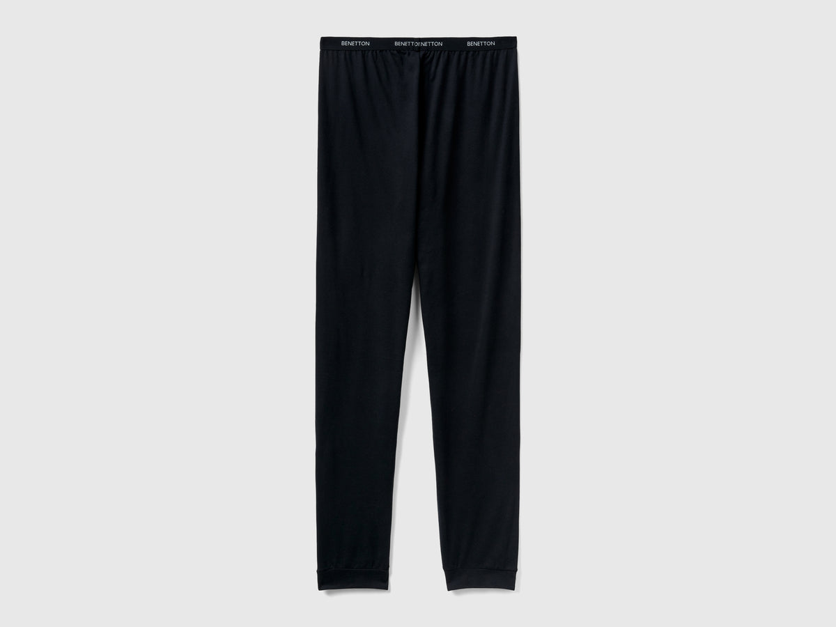 Pantaloni con elastico logato