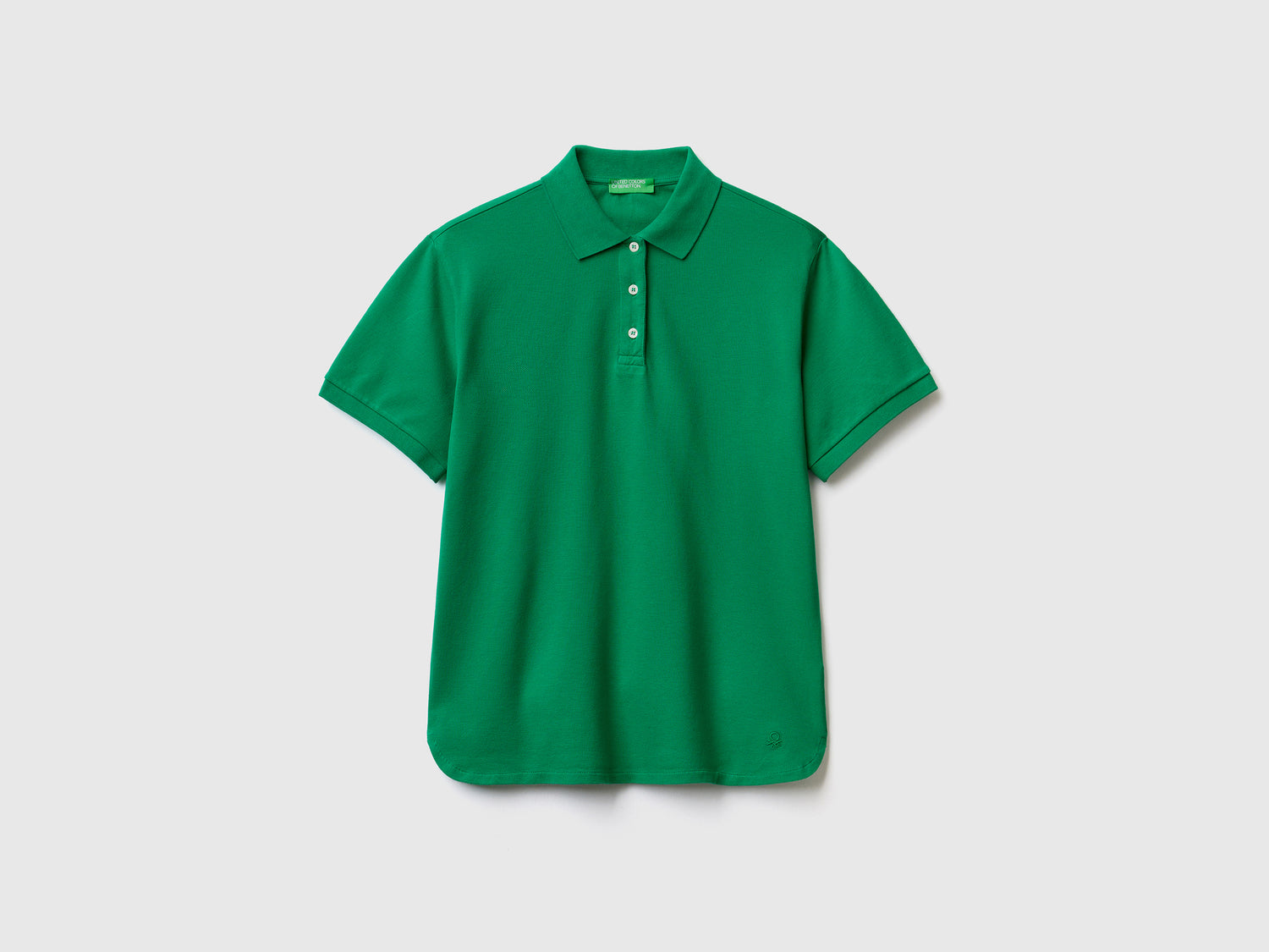 Polo a manica corta in piquet di cotone elasticizzato da donna verde | Benetton Outlet