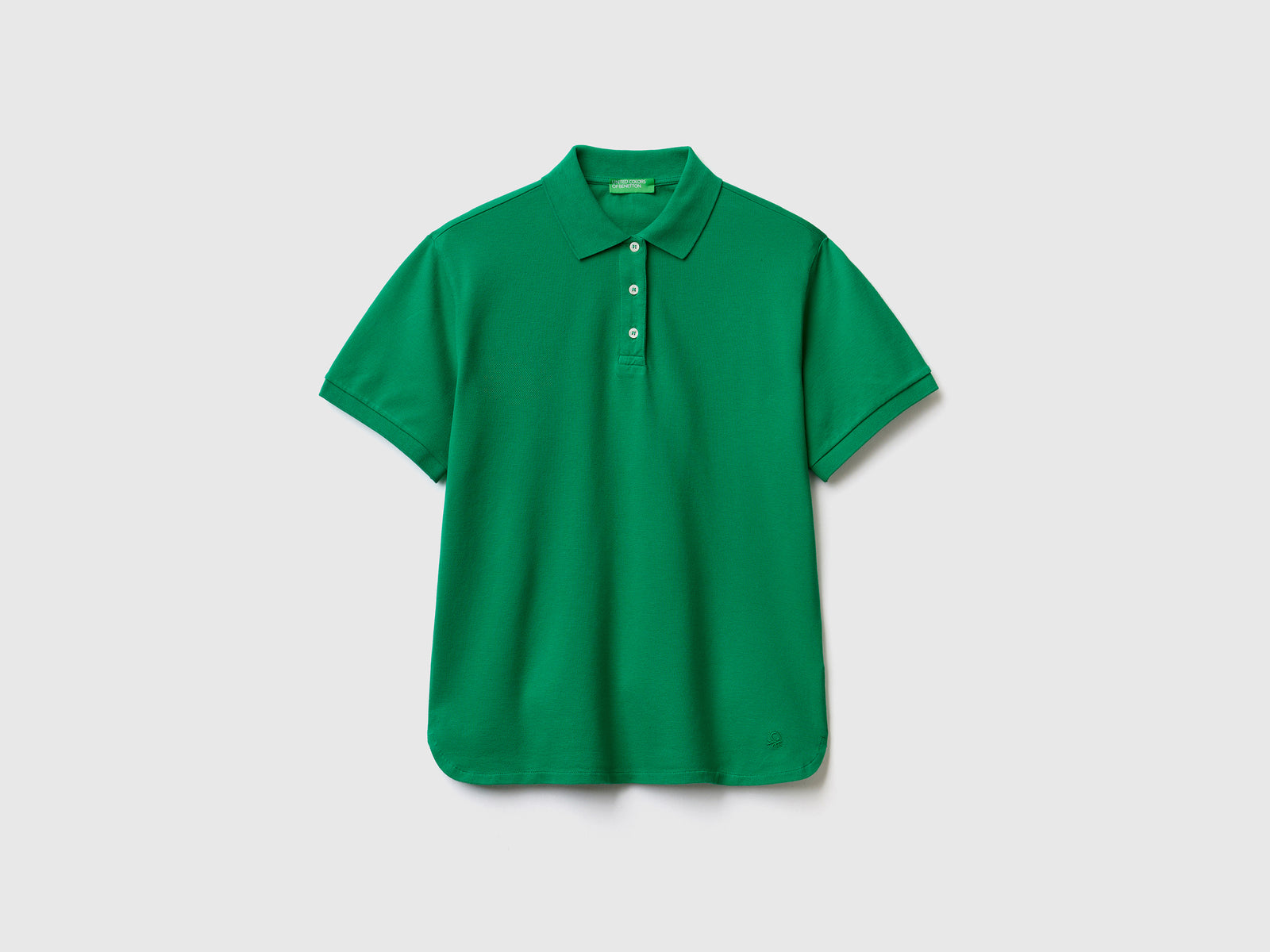 Polo a manica corta in piquet di cotone elasticizzato da donna verde | Benetton Outlet