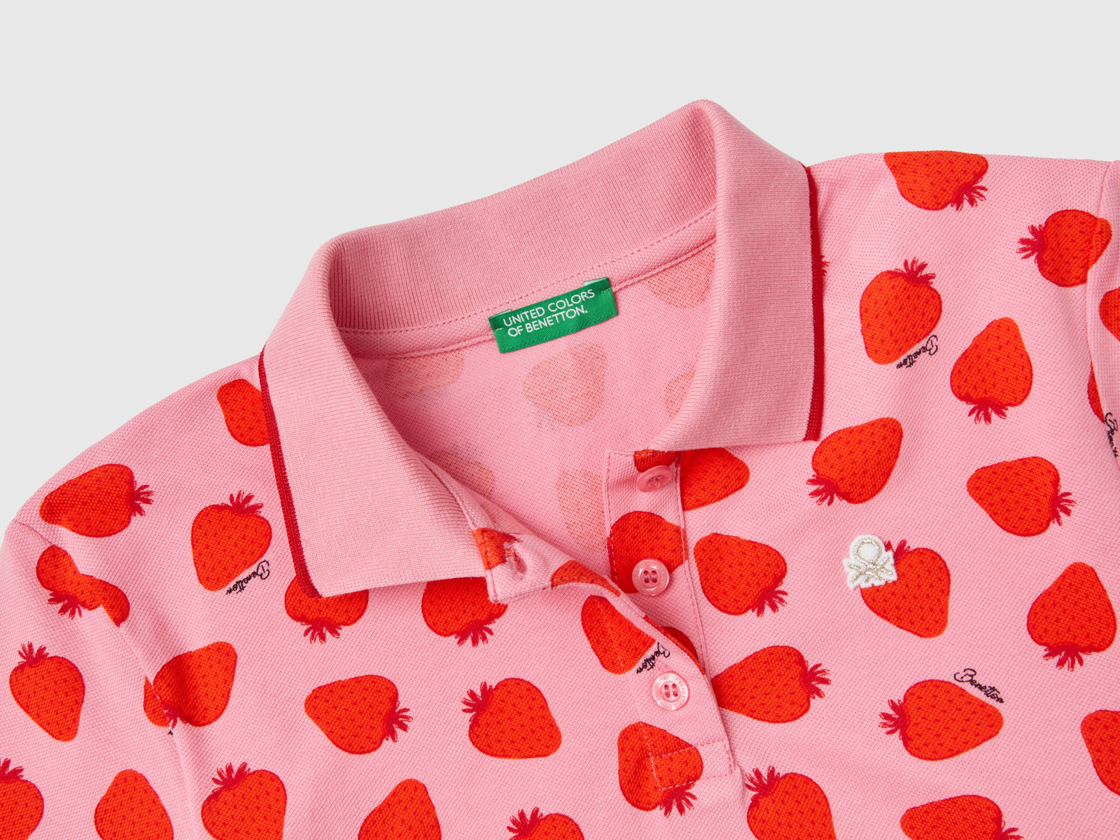 Polo con pattern fragole da bambina rosa 2 | Benetton Outlet