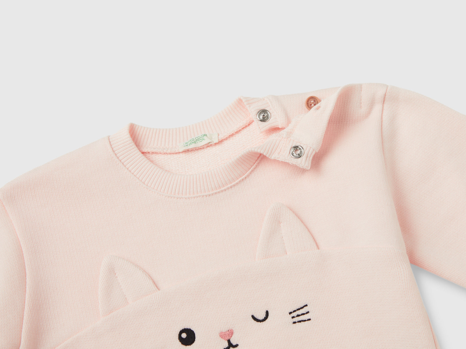 Felpa con ricamo e patch in cotone bio da neonato rosa tenue 3 | Benetton Outlet