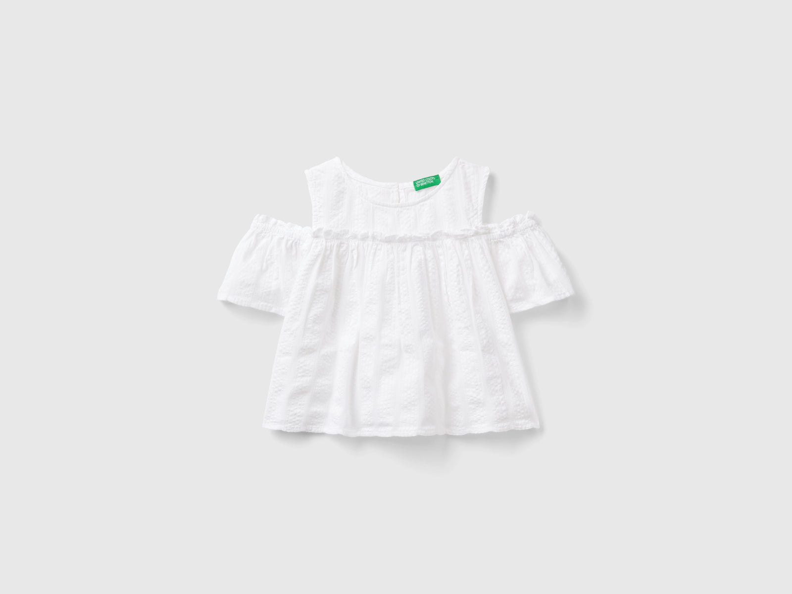 Blusa con rouches da bambina bianco | Benetton Outlet