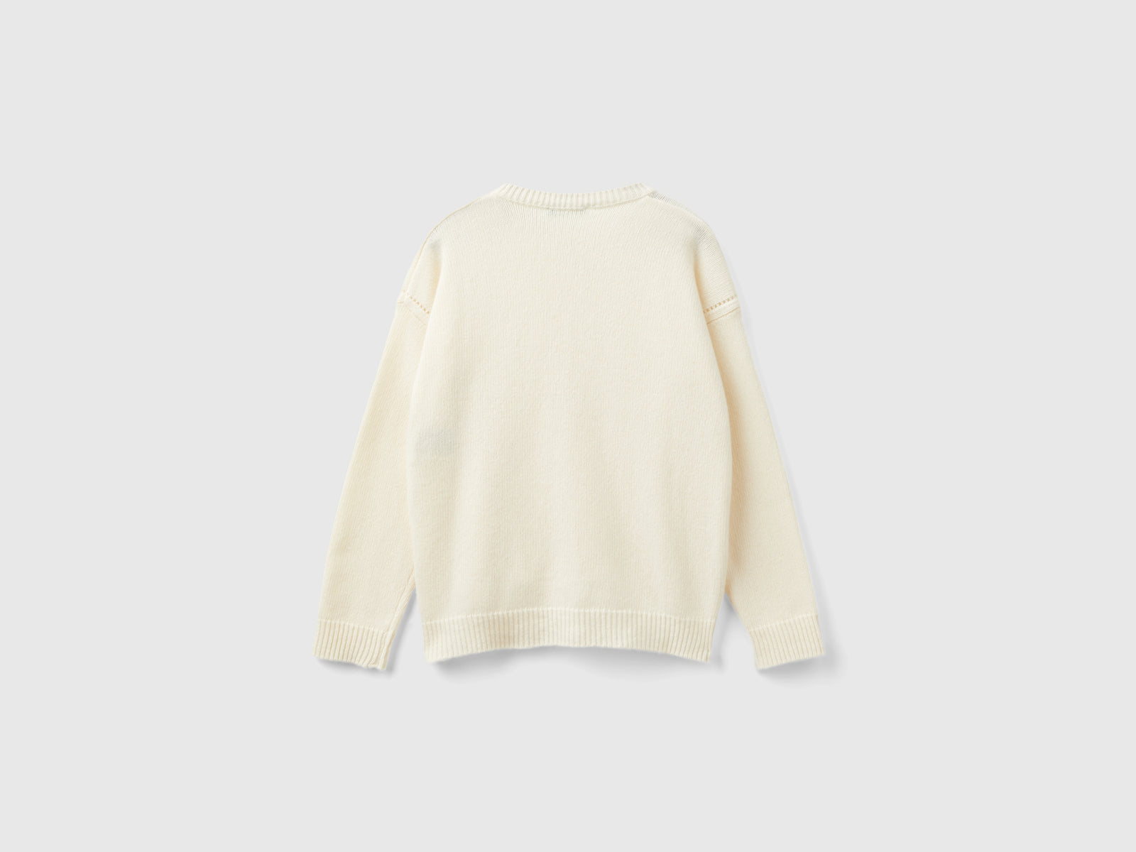 Cardigan girocollo con logo in strass da bambina bianco panna 2 | Benetton Outlet