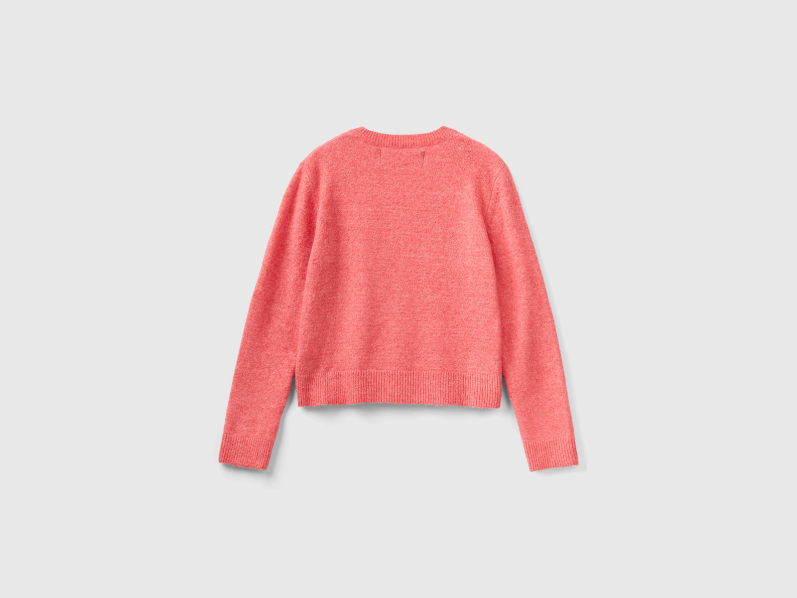 Maglioncino in filato riciclato da donna salmone 2 | Benetton Outlet