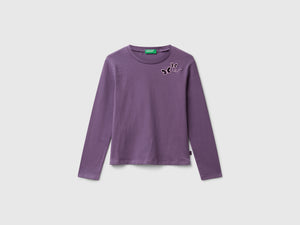 T-shirt con farfalle cut out